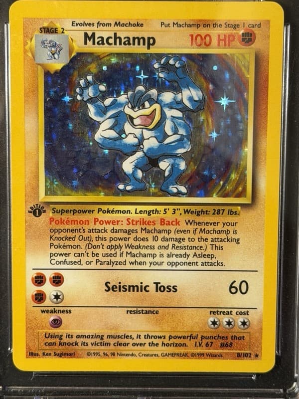 1999 POKEMON BASE SET 1ST EDITION #8 MACHAMP-HOLO PSA 8 2