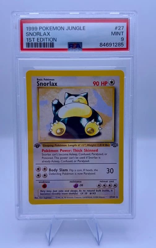 SNORLAX 1ST EDITION 27/64 – JUNGLE (1999) – PSA 9 MINT